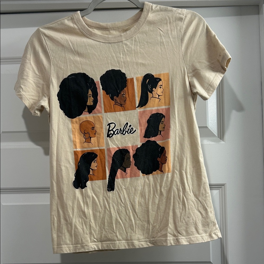 Barbie Cream Short Sleeve Tee with Black and Brown Graphics